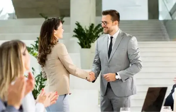 successful business handshake moment